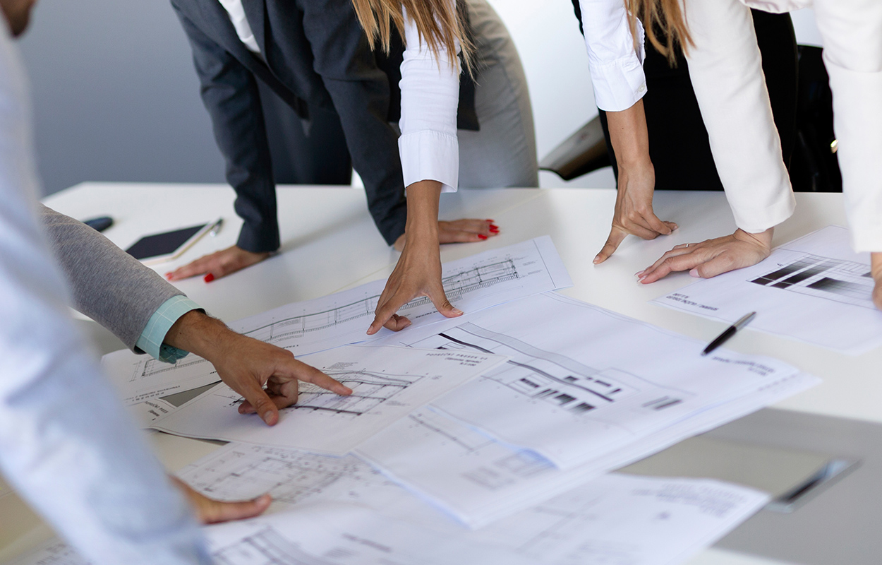 reviewing drawings with a clients